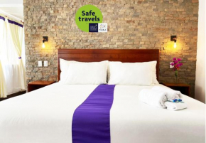 Отель Hotel & Suites Cerro Roj0  Тлатлаукитепек